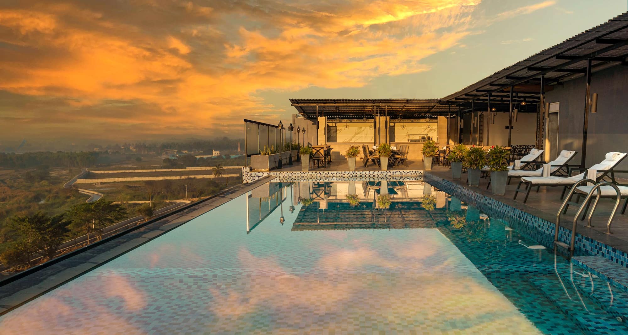 The Elite Narasapura, a member of Radisson Individuals - Pool Side