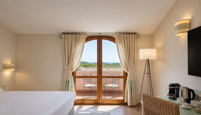 Veridia Resort Sardinia, a member of Radisson Individuals - Zimmer Annehmlichkeiten