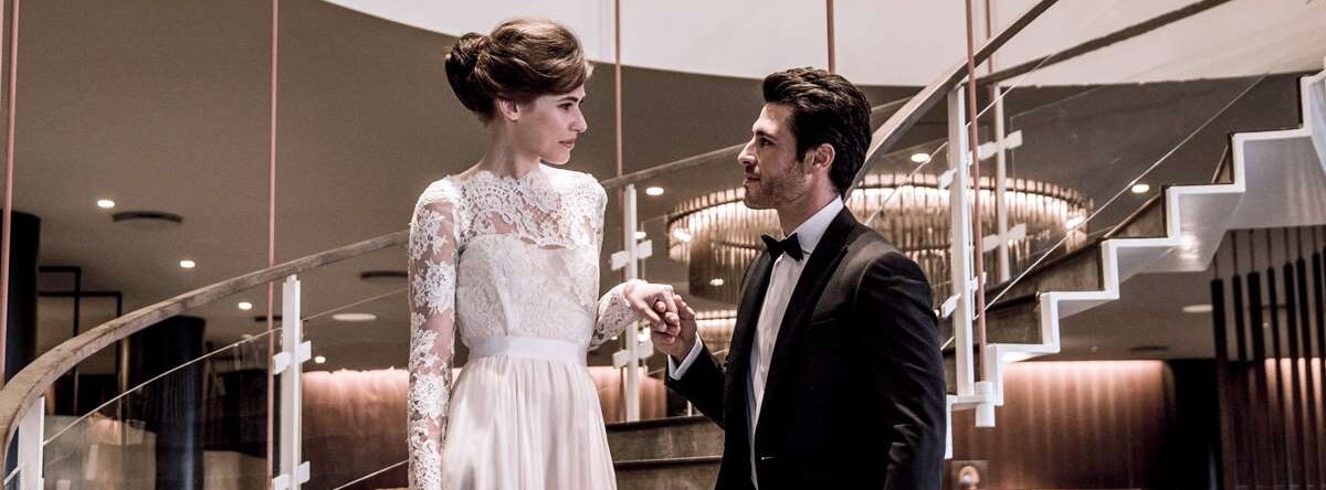 Weddings - Bride and Groom on interior stairs